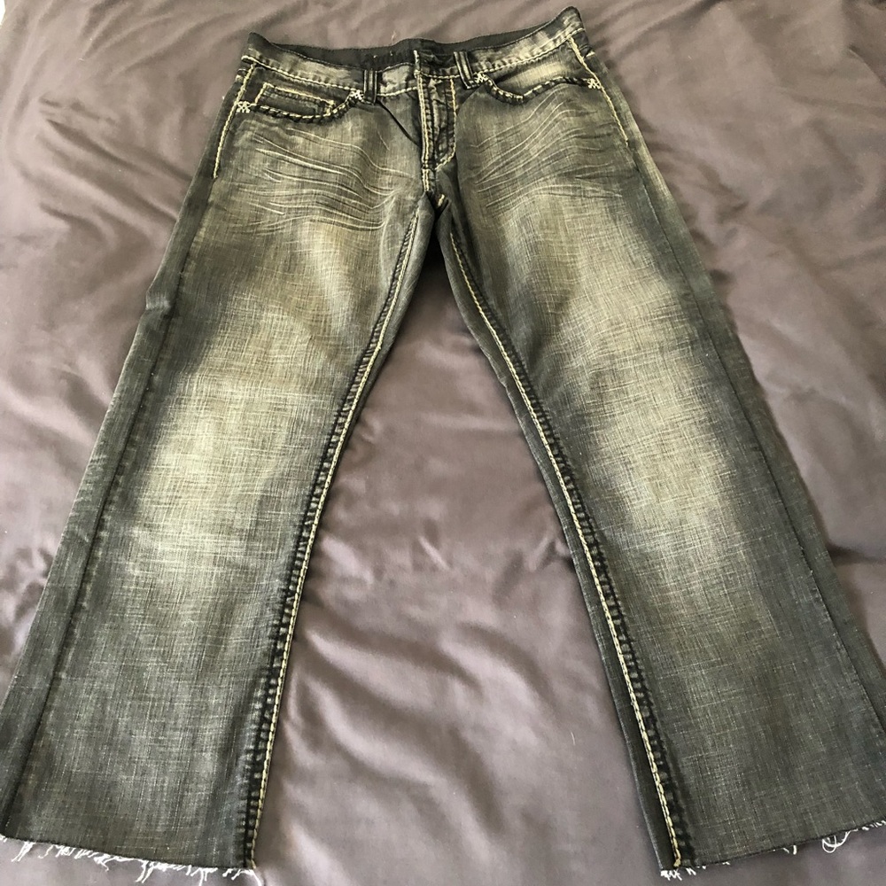 Antique Rivet boot cut distressed jeans